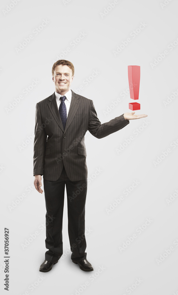 Businessman with an exclamation mark on his hand Businessman with an exclamation mark on his hand