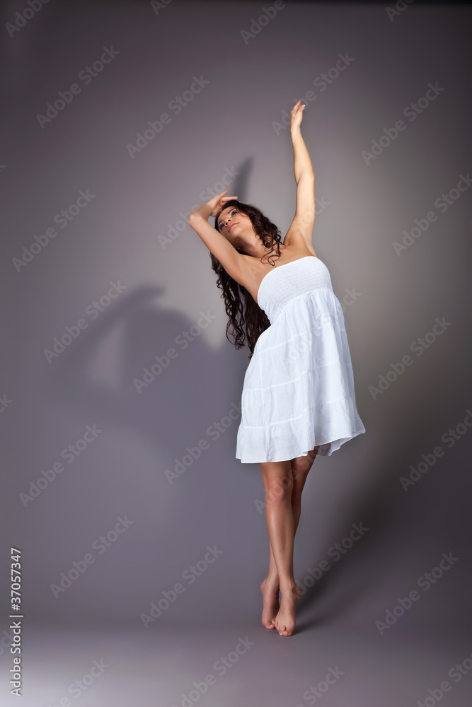 Naklejka premium Perfect young dancer in white cloth