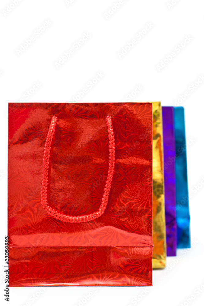 gift shopping bags over white background