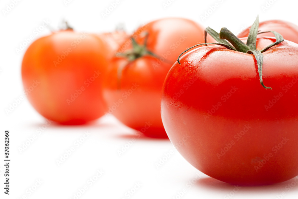 Tomatoes isolated on white background Tomatoes isolated on white background