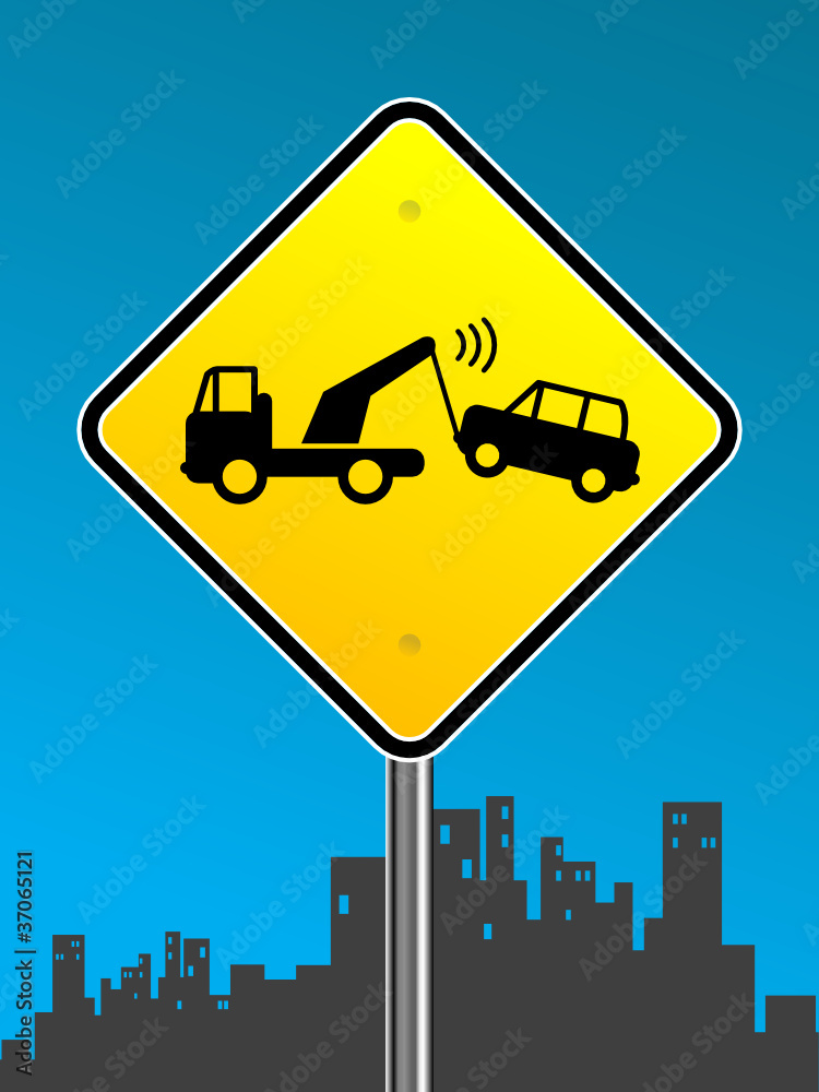 Warning tow away zone sign on urban background Warning tow away zone sign on urban background