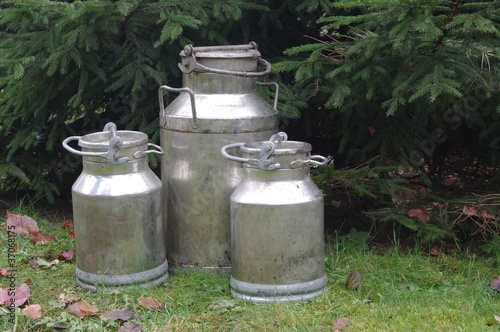 three metal cans