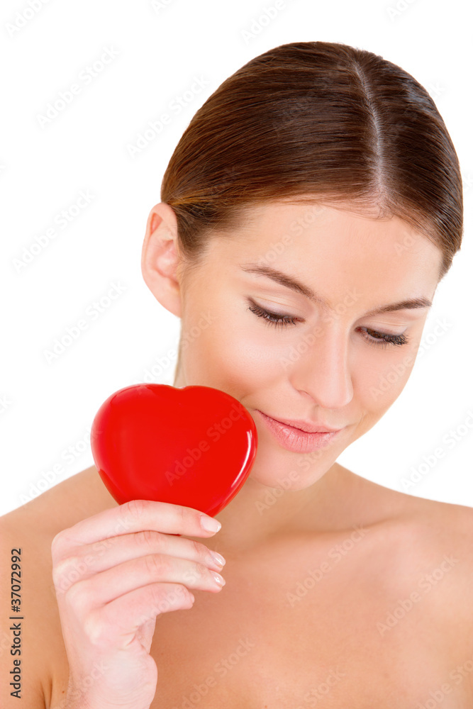 Portrait of beautiful young woman with red heart on white Portrait of beautiful young woman with red heart on white