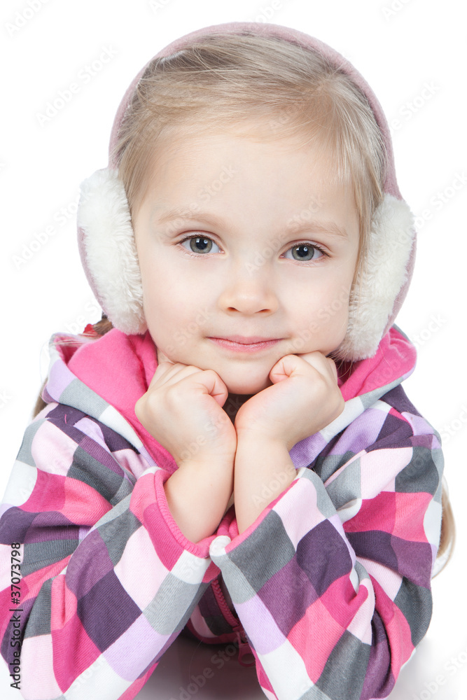 Happy little blonde girl in winter headphones on white Happy little blonde girl in winter headphones on white