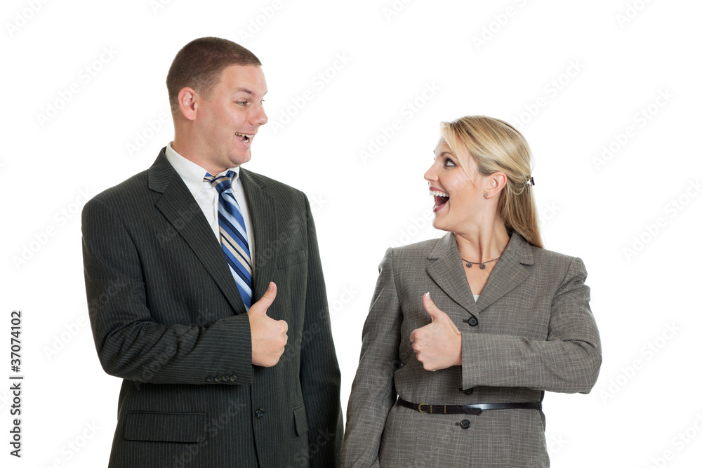 Successful business team giving thumbs up