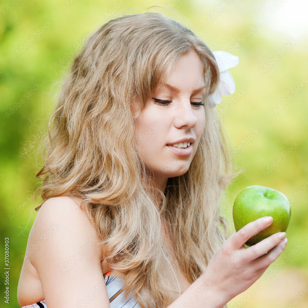 Beautiful woman with green apple Beautiful woman with green apple