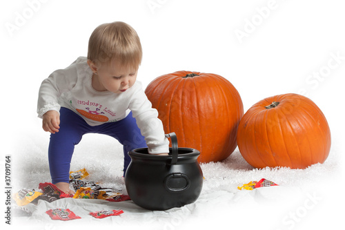 Girl with Pumpkins and Candy