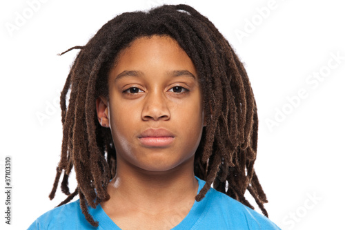 close up portrait of a young rasta boy photo