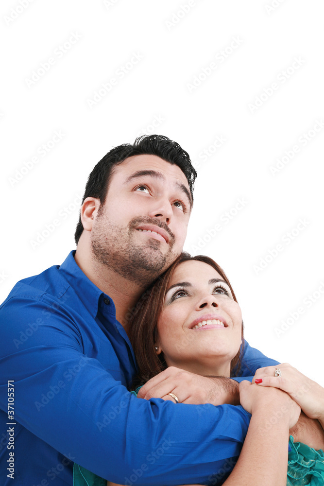 Closeup portrait of a happy  couple looking at something interes