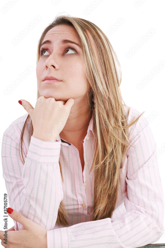 Pensive businesswoman at desk isolated on white background Pensive businesswoman at desk isolated on white background