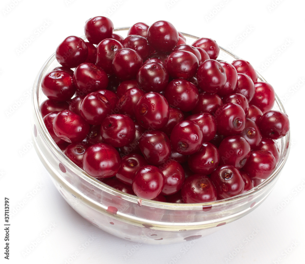 Bowl with ripe cherries. Isolated on a white background. Bowl with ripe cherries. Isolated on a white background.