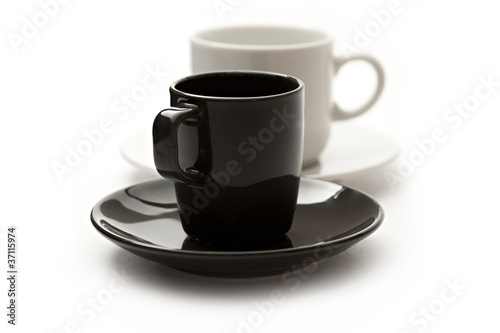 A set of coffee cups and saucers