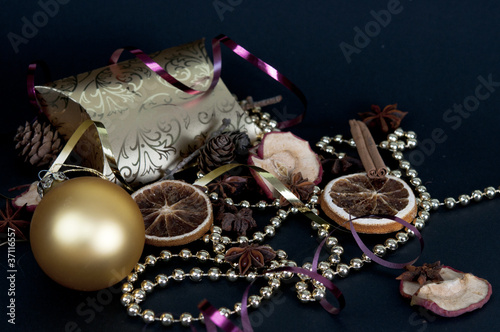 Gold christmas decorations with dried fruits