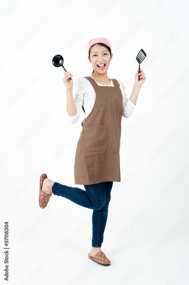 attractive asian woman with cooking equipment attractive asian woman with cooking equipment