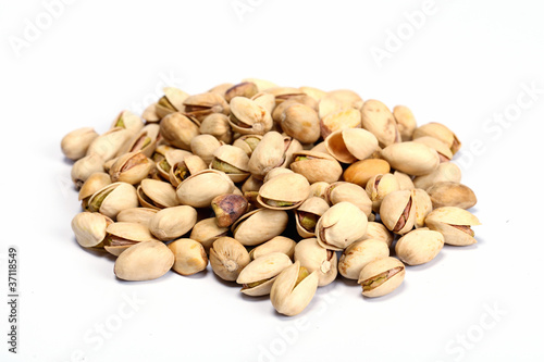 Toasted pistachios on a white background
