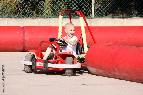 child on go cart