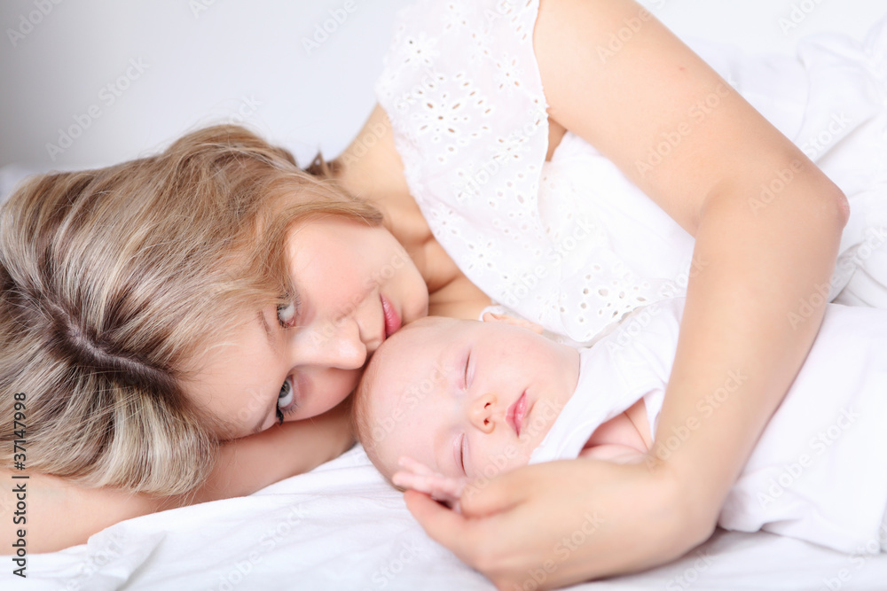 Portrait of a young mother and baby Portrait of a young mother and baby