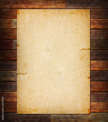 Old paper on the wood background