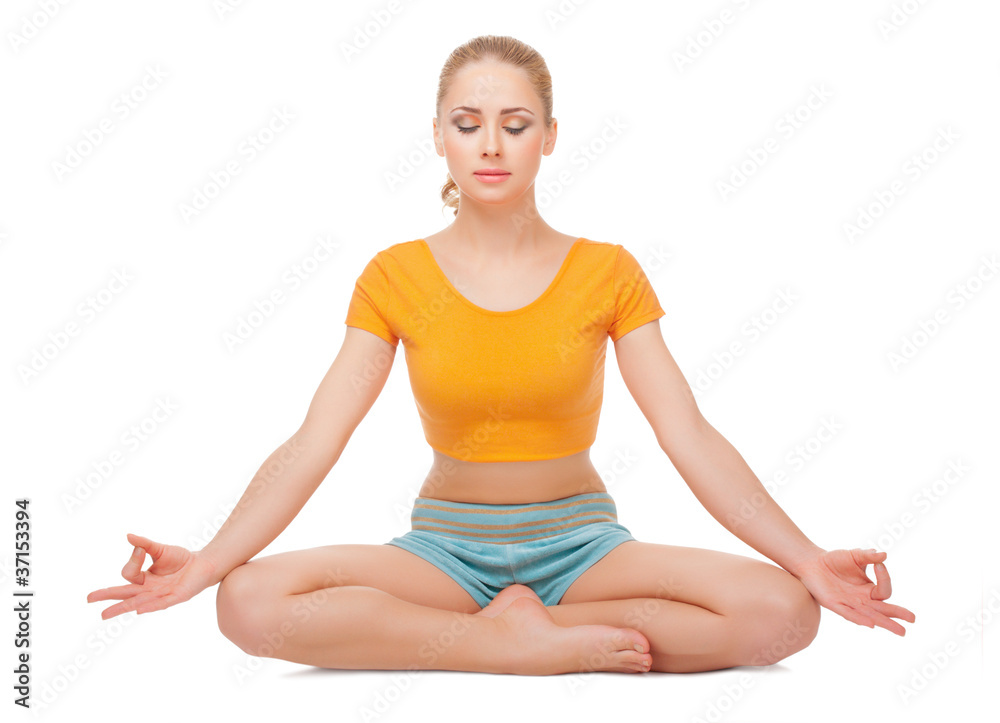 Young woman doing gymnastic exercises Young woman doing gymnastic exercises