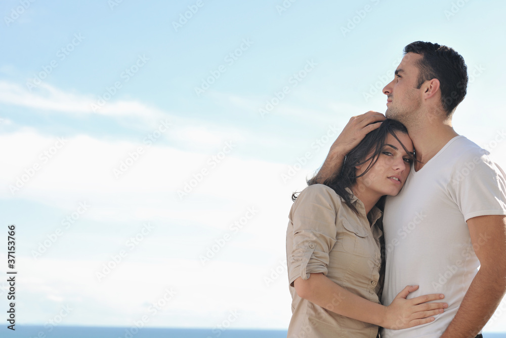 couple relaxing on balcony