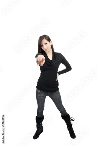 Young caucasian woman pointing jeans boots sweater