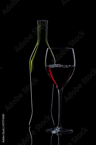 Glass and bottle of red wine