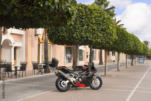 Motorbike on the promenade in Marbella Andalucia Spain