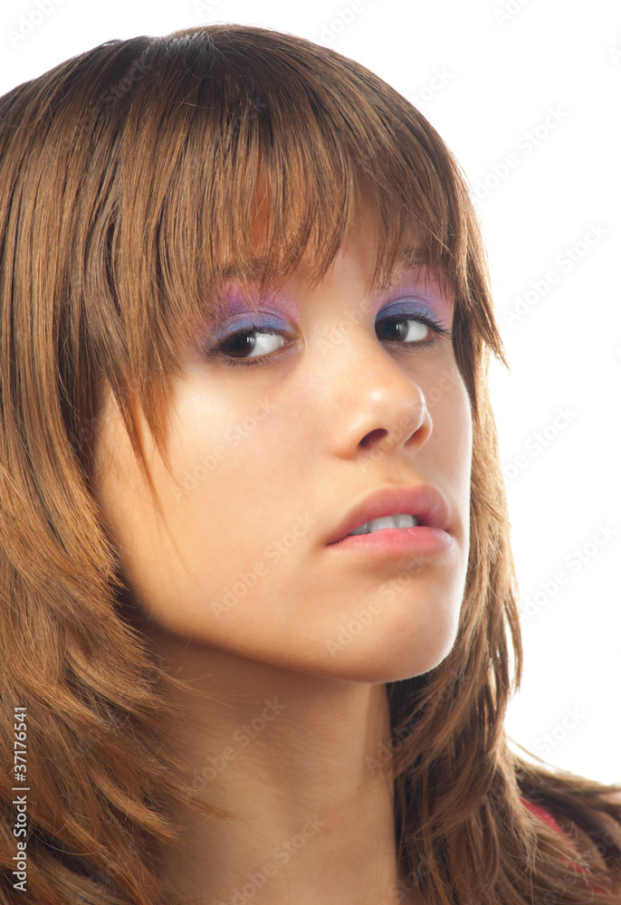 Portrait of the beautiful girl with serious look on her face Portrait of the beautiful girl with serious look on her face