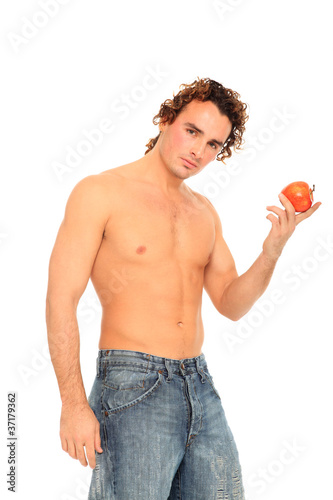 young man holding an apple