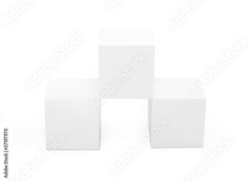 three white paper cubes