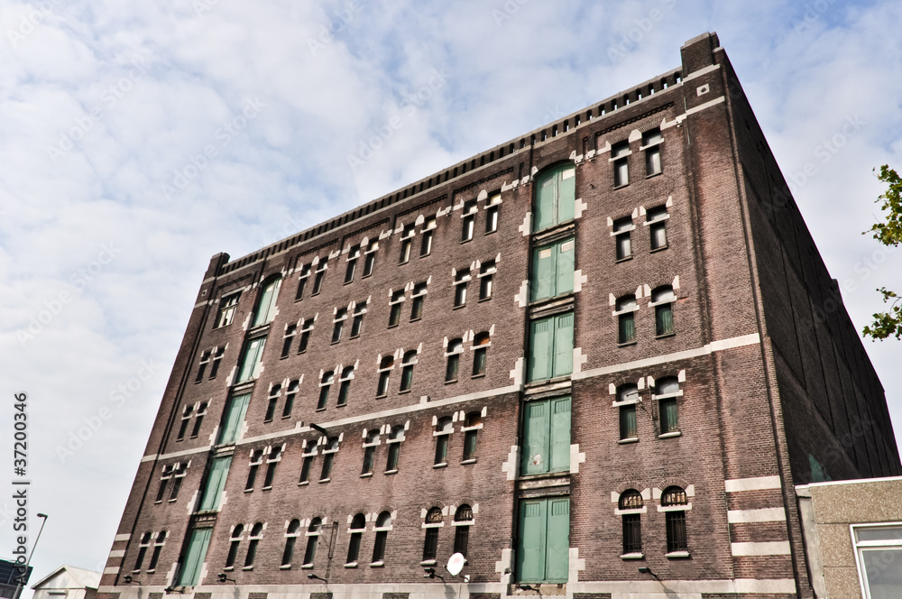 Fototapeta premium low angle view to the old brick factory building