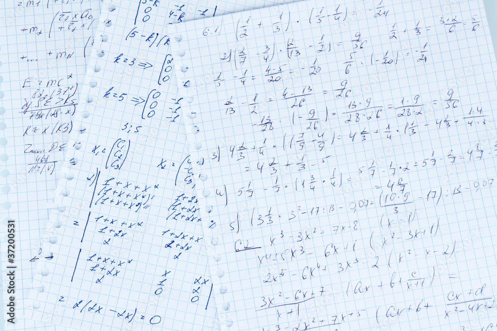 Math, physics and geometry on copybook page isolated on white Math, physics and geometry on copybook page isolated on white