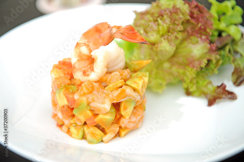 king prawns with salad on a plate