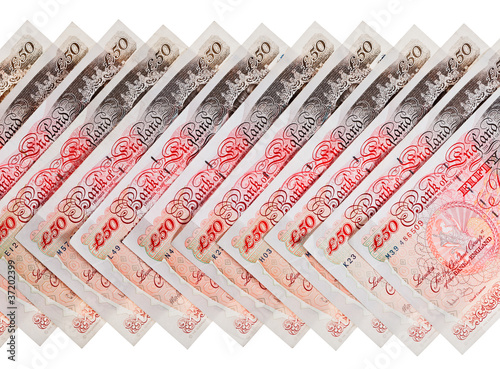 Many 50 pound sterling bank notes business background, isolated