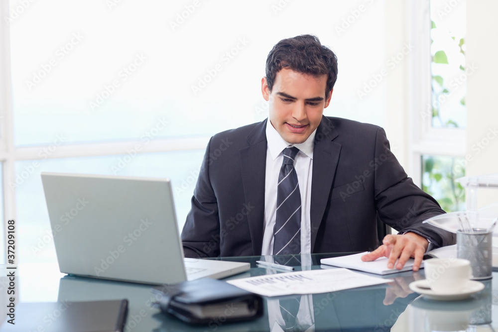 Thoughtful businessman working Thoughtful businessman working