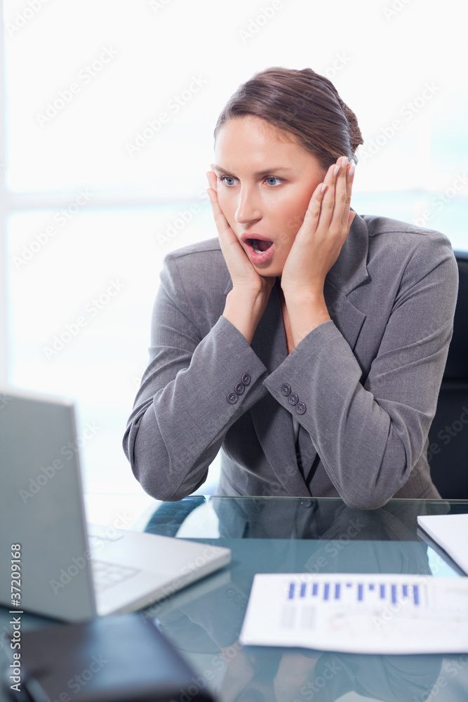 Portrait of a chocked businesswoman working Portrait of a chocked businesswoman working
