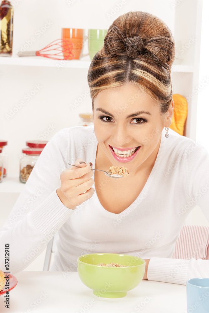 lovely housewife with cup of muesli lovely housewife with cup of muesli