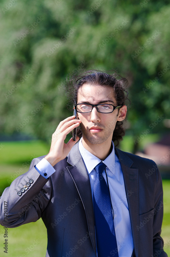 Young businessman at the street scene Young businessman at the street scene