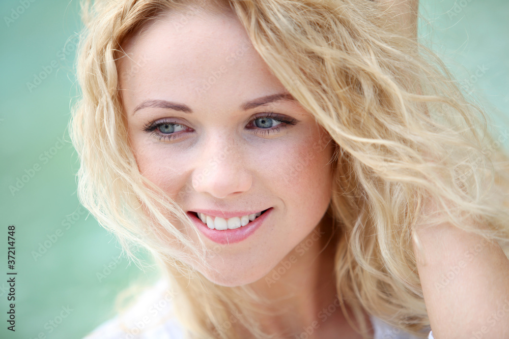 Portrait of beautiful blond smiling woman Portrait of beautiful blond smiling woman