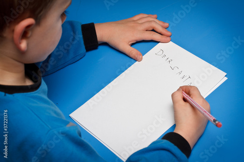 Boy writing to Santa