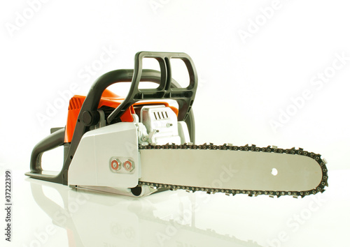 Chainsaw over the white background