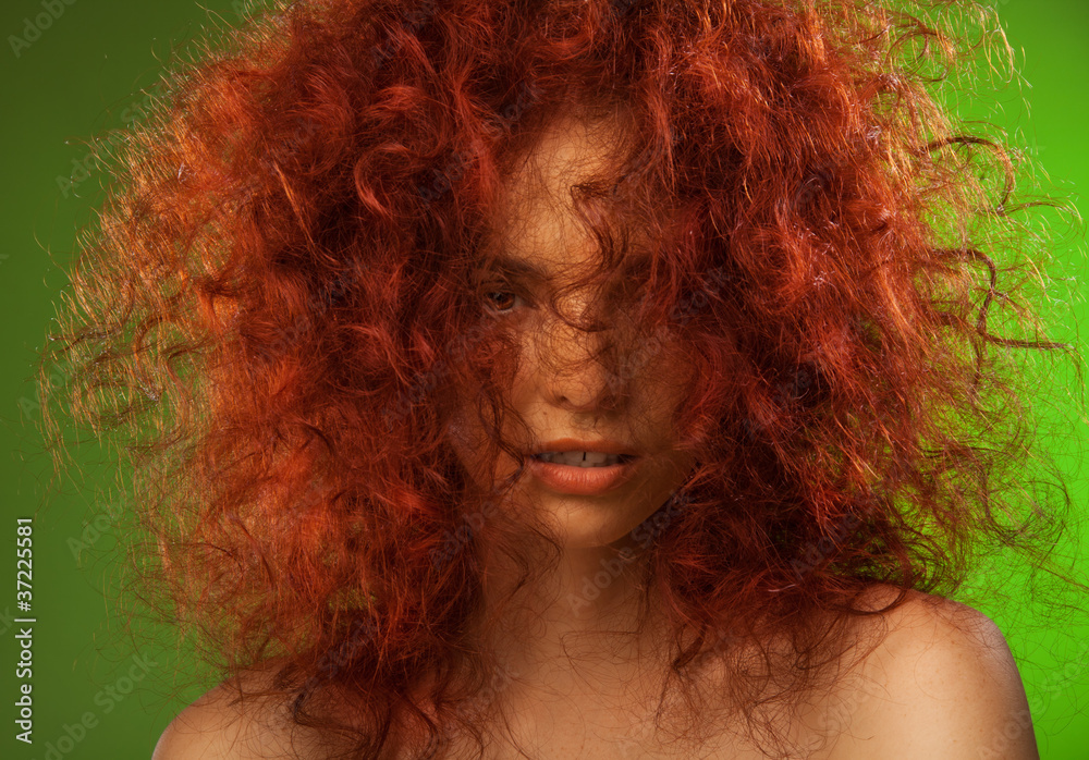 Red curly hair woman beauty portrait Red curly hair woman beauty portrait