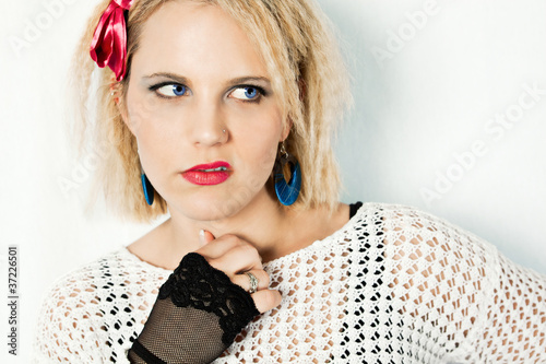 Bild auf Leinwand 1980s girl curling up lip with attitude