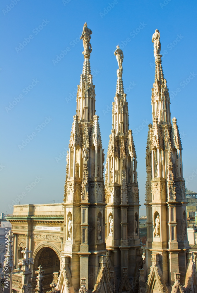 gothic spires on roof of Duomo (cathedral), Milan, Italy gothic spires on roof of Duomo (cathedral), Milan, Italy
