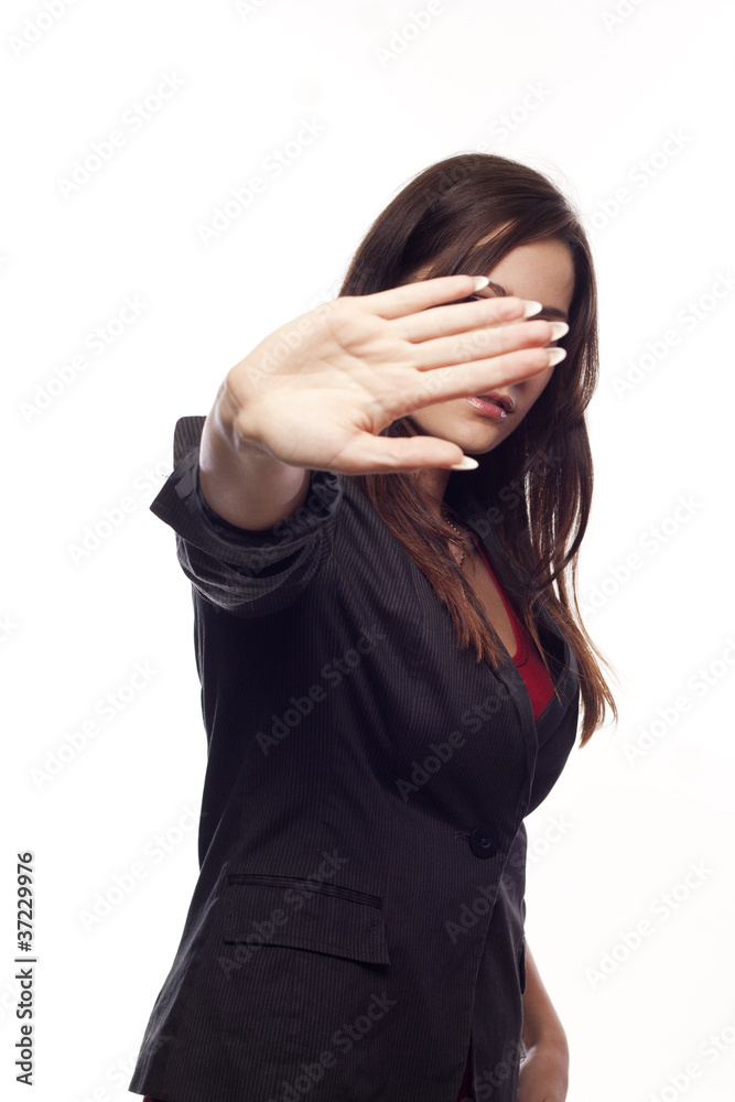 Young businesswoman making stop sign Young businesswoman making stop sign