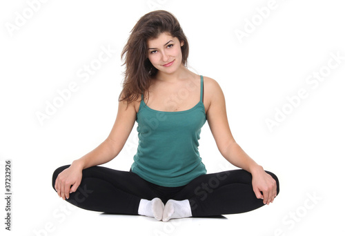 young attractive woman doing fitness over white