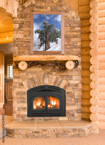 Log Cabin Home Interior with Warm Fireplace with wood, flames, a