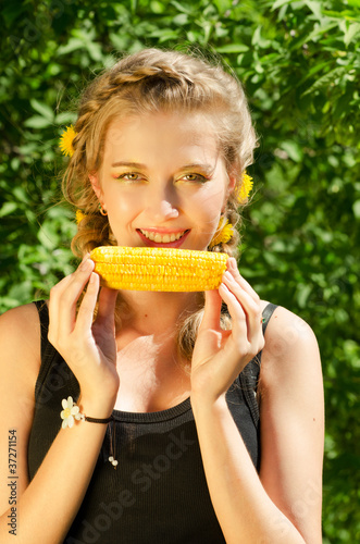 woman eating corn-cob