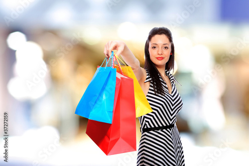  attractive young girl with shopping bags