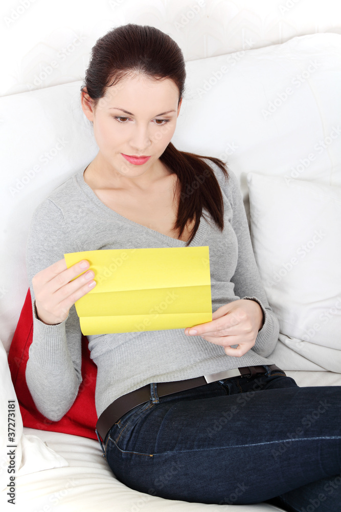 Beautiful woman having a look at the documents. Beautiful woman having a look at the documents.
